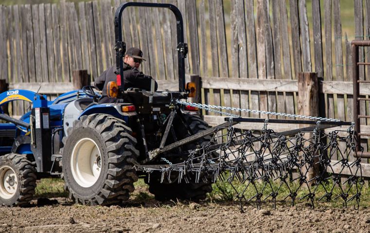 Three-Point Lift for Harrows